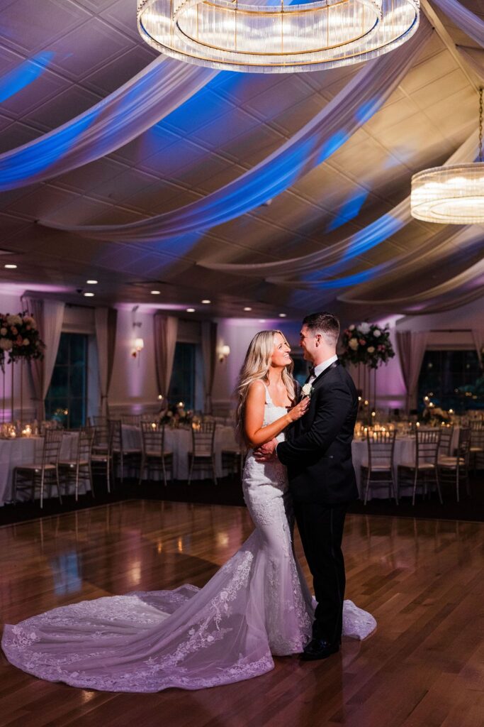 Bride and groom dance in Flowerfield ballroom.